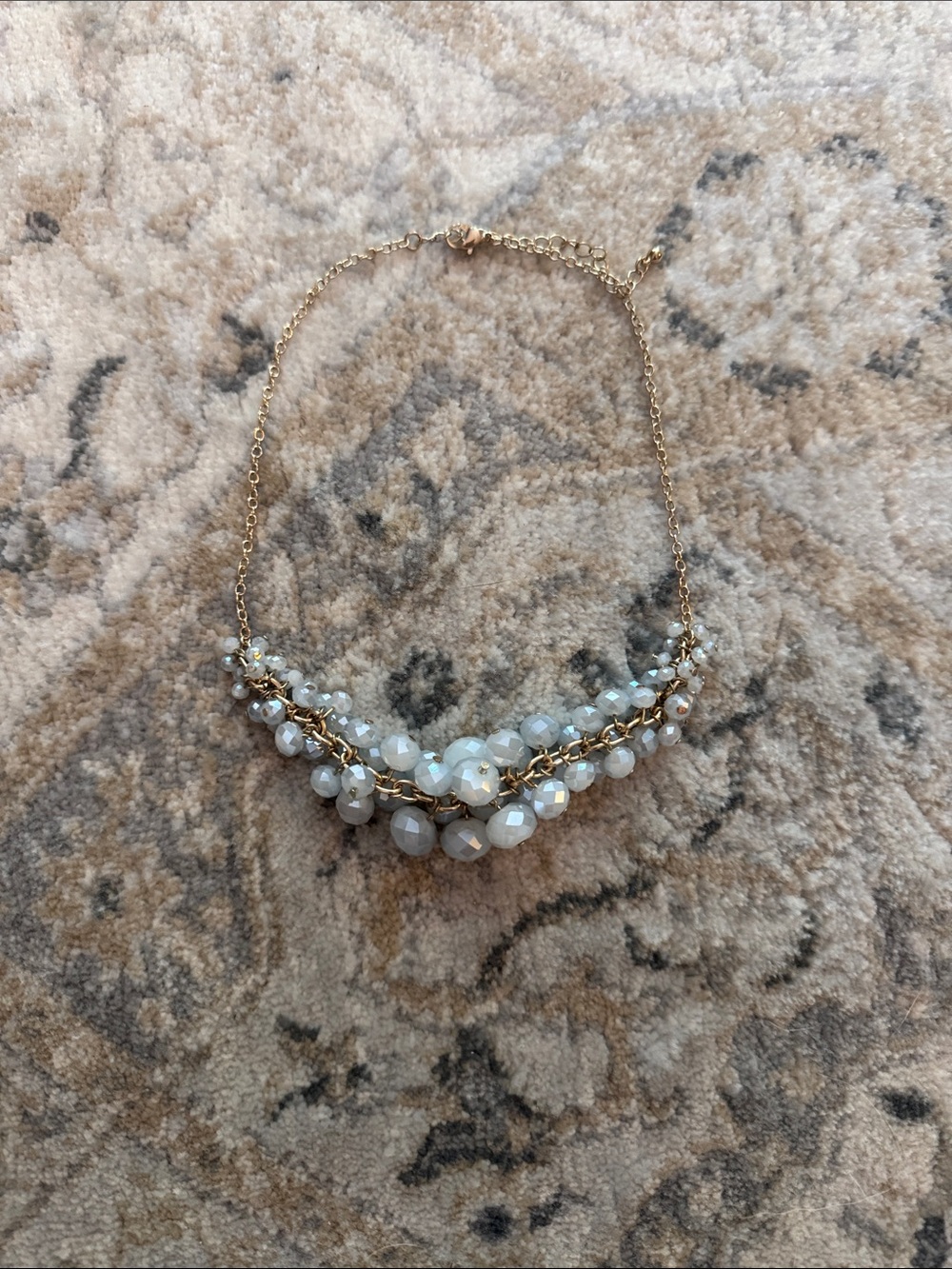 Necklace, like new, gold with light blue beads